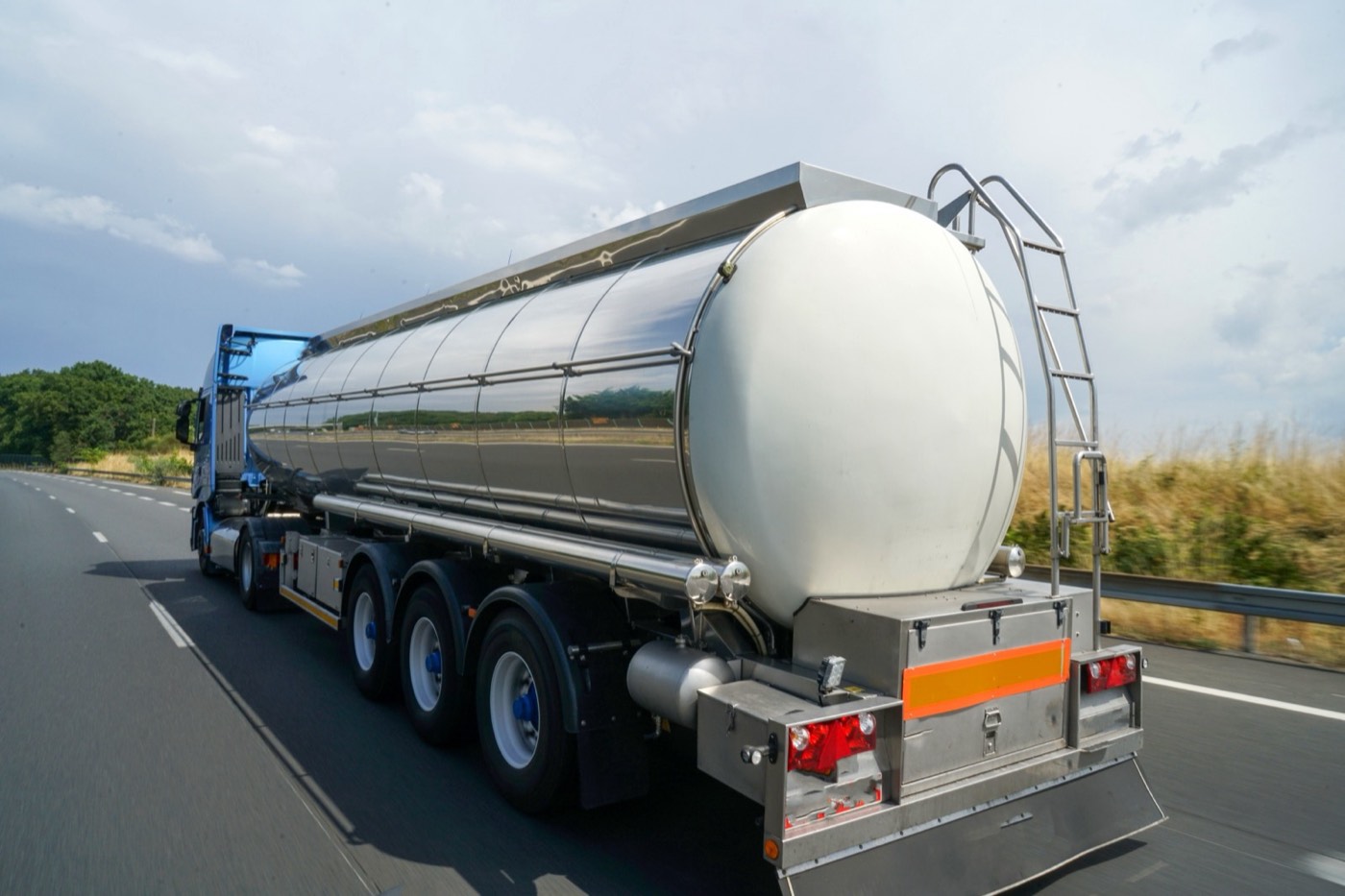 Stainless tanker truck on the motorway